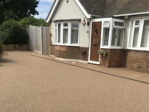 This is a photo of a Resin bound driveway installed and carried out in Cardiff. All works done by Resin Driveways Cardiff